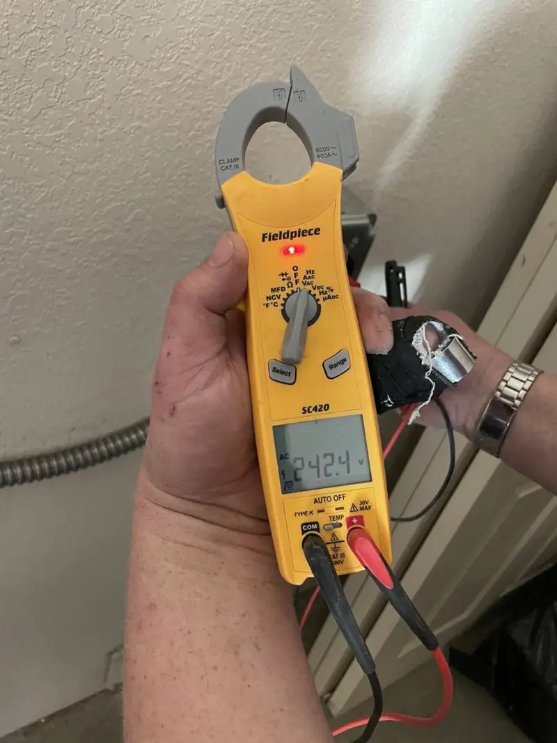 Voltage testing with clamp meter during Generator Installation in West Greenwich